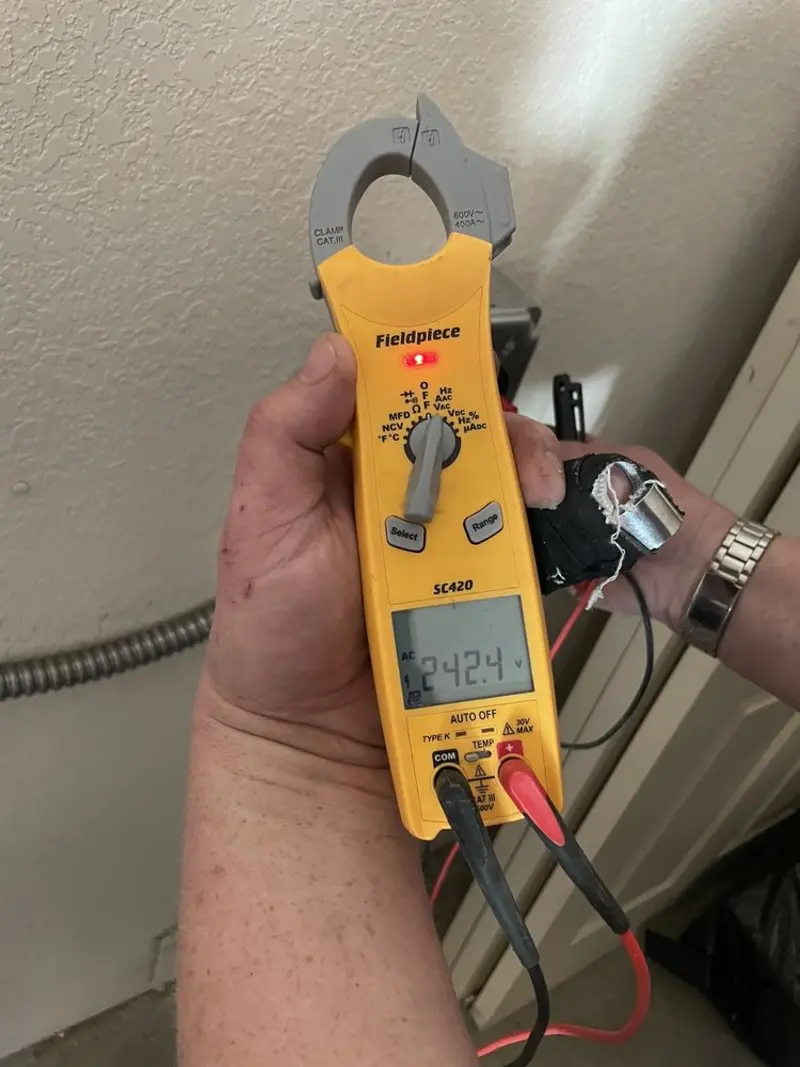 Voltage testing with clamp meter during Aluminum Wiring Replacement in Lake Forest